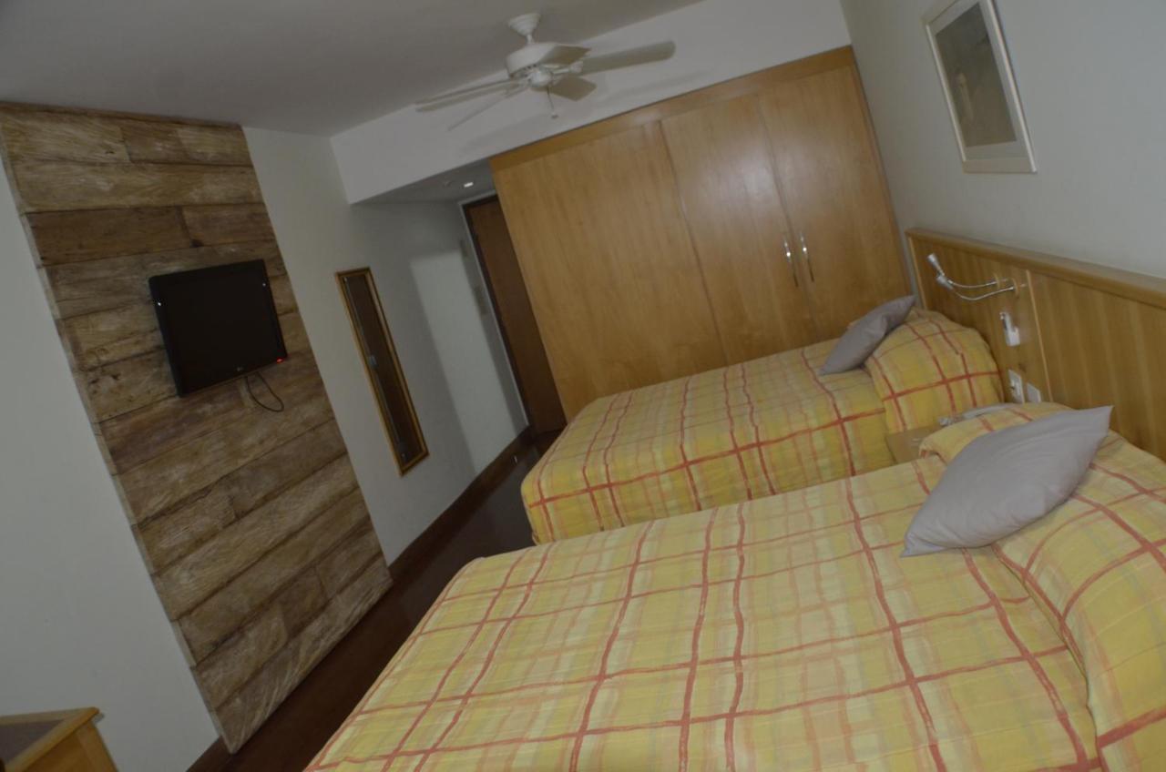 Constantino Hotel E Eventos ジュイス・デ・フォーラ エクステリア 写真 A typical room at the hotel