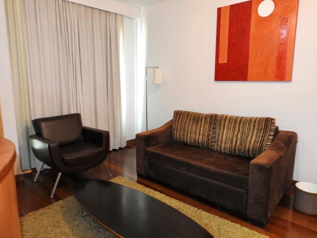 Constantino Hotel E Eventos ジュイス・デ・フォーラ エクステリア 写真 A living room